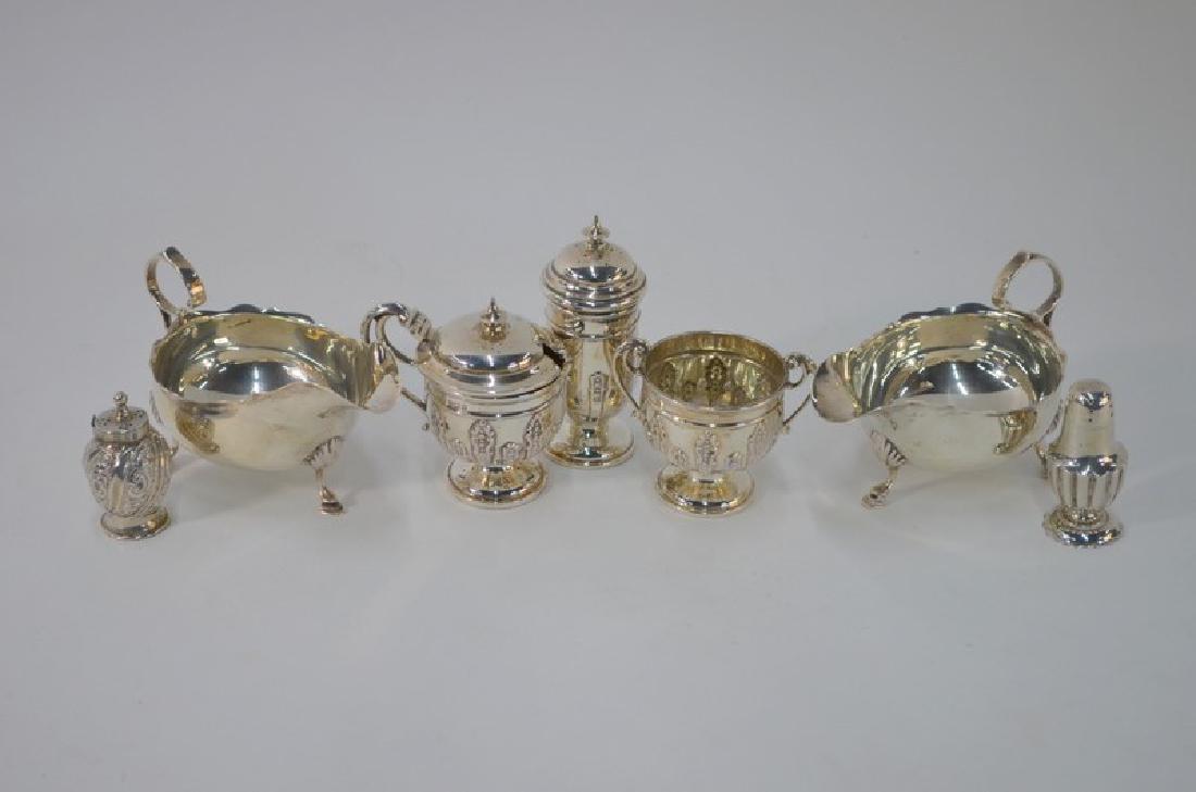 Victorian silver sauce boats etc.: A pair of late Victorian silver sauce boats on hoof feet, Charles Stuart Harris, London 1899, to/w a three-piece condiment set, Henry Matthews, Birmingham 1909 and two late Victorian silver miniature