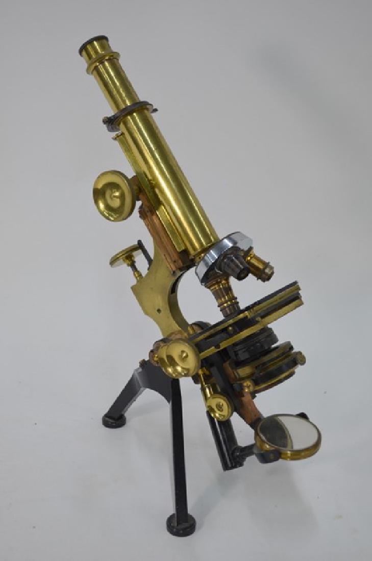 A brass and lacquered compound microscope: A brass and lacquered compound microscope by W Watson & Sons, London - unboxed