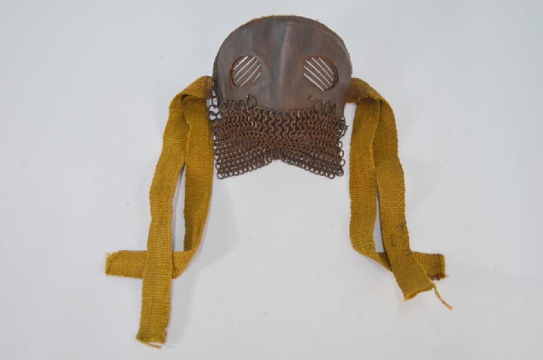 A World War I leather and chain mail tank 'Spatter': A World War I leather and chain mail tank 'Spatter' mask, with webbing straps