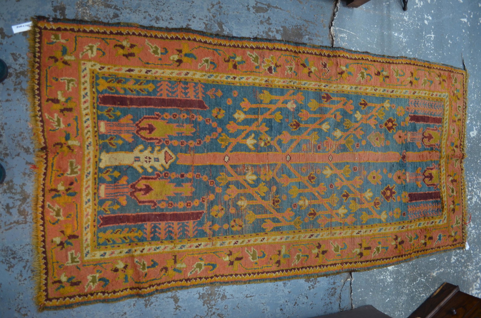 Two antique Turkey rugs circa early 1900's: Two antique Turkey rugs circa early 1900's, the typical geometric designs on mid blue grounds, 206 cm x 100 cm and 198 cm x 112 cm (2)