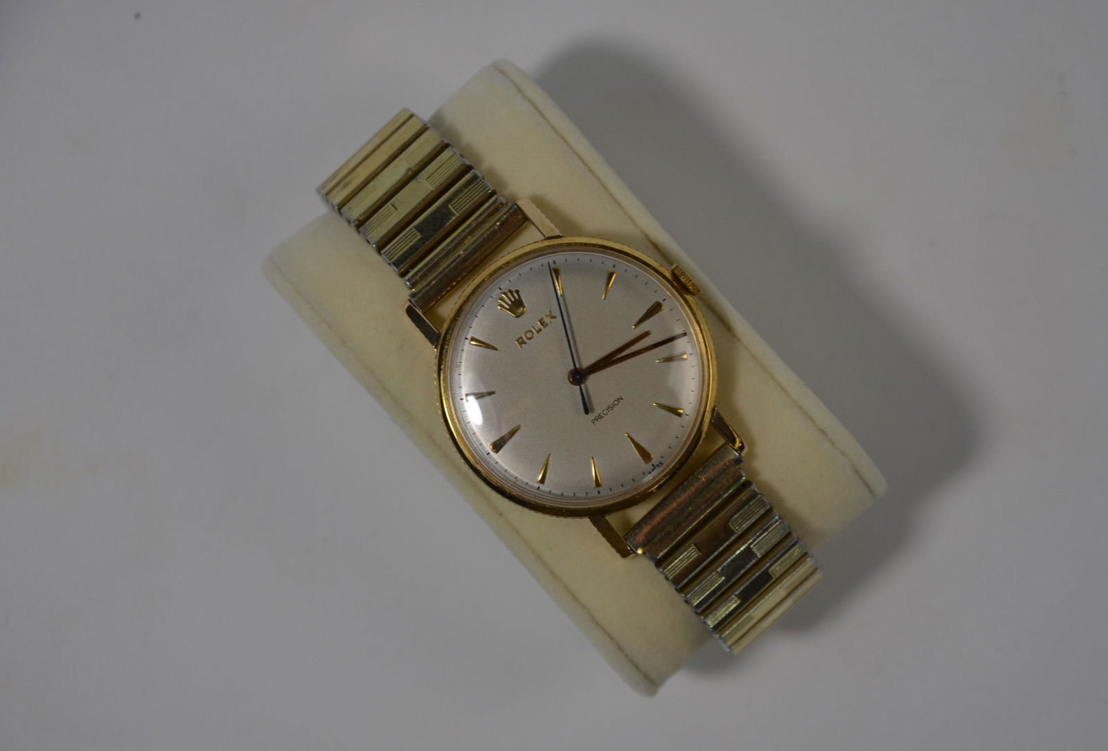 A gentleman's 9ct gold Rolex Precision wristwatch: A gentleman's 9ct gold Rolex Precision wristwatch with 17-jewel movement no.71164, the case London 1961, on base-metal expanding strap