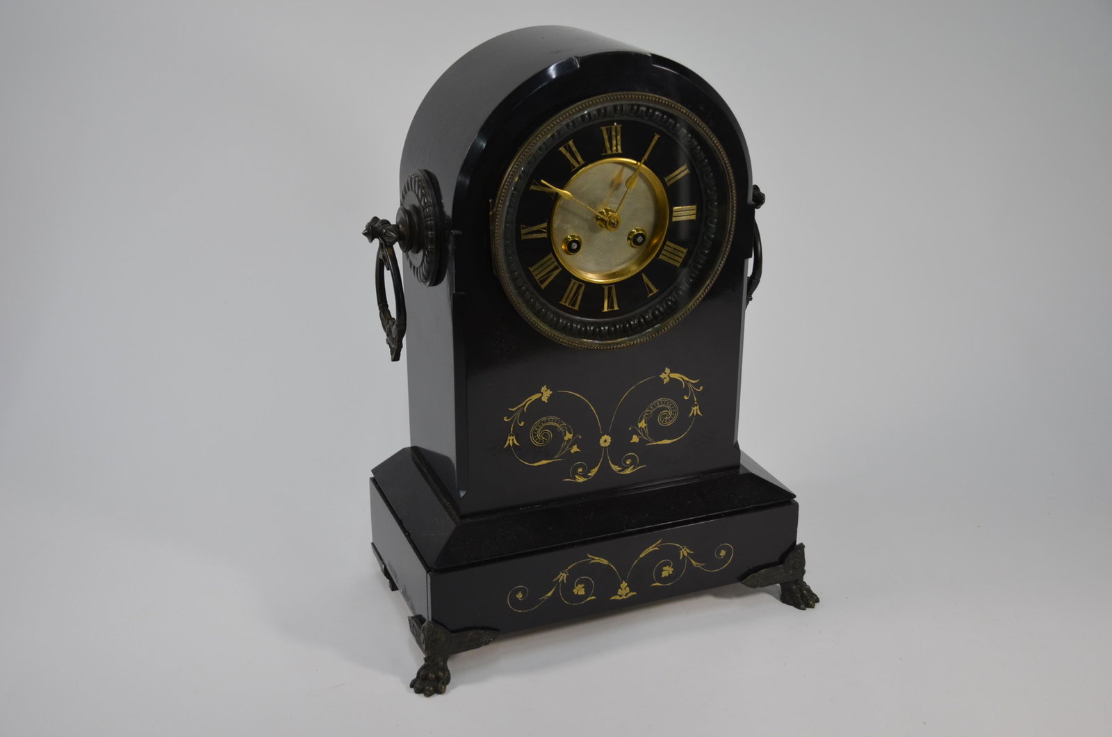 A late 19th century slate mantel clock, the gilt: A late 19th century slate mantel clock, the gilt decorated dome top case with 8-day two train Marti & Co movement striking on a bell, 39 cm h o/all