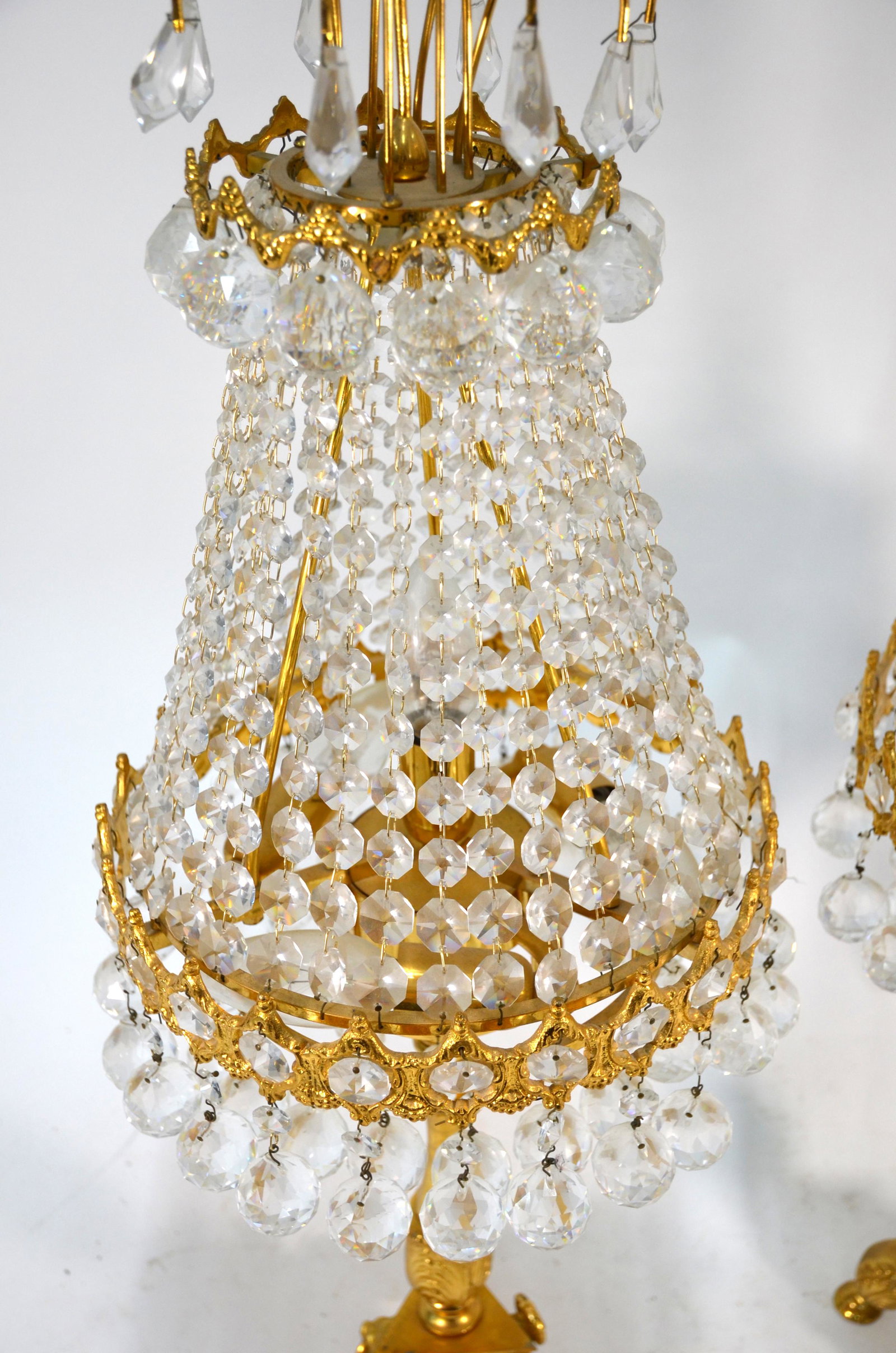 A good pair of Austrian ormolu glass lustre strung: A good pair of Austrian ormolu glass lustre strung table lamps, 78 cm h (2)