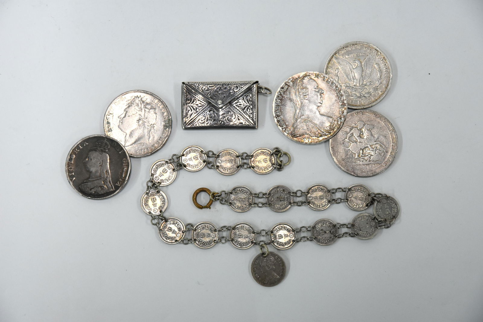 Victorian silver vesta case and four small boxes: A Victorian silver vesta case of plain design with gilt interior, Lawrence Emanuel, Birmingham 1887 (little used), to/w an Edwardian heart-shaped ring-box, William Harrison Walter, Birmingham 1906, 6.