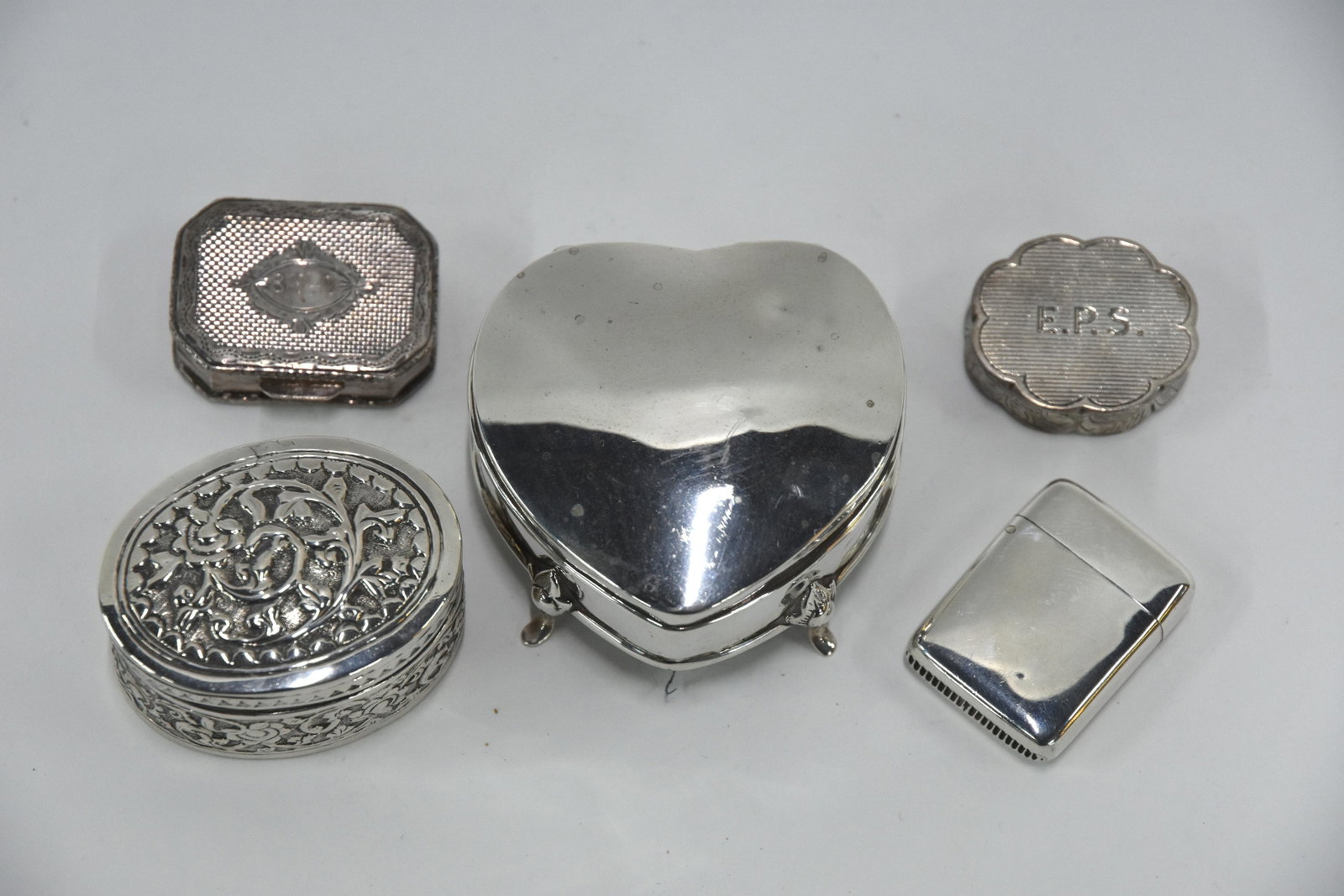 Silver stamp-case, coins, etc.: An engraved silver fob stamp case in the form of a miniature envelope, Adie & Lovekin Ltd, Birmingham 1911, to/w various silver coins, including Austrian 1780 Maria Theresa thaler EF, George III crown