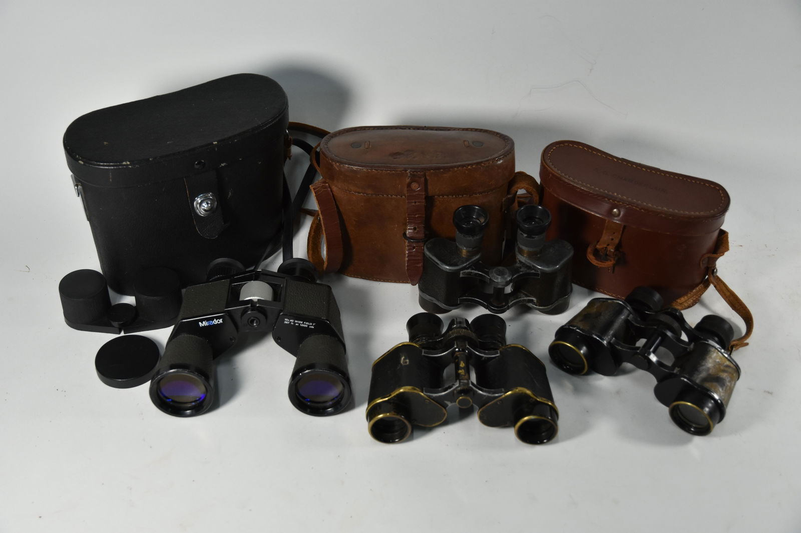 A cased set of Carl Zeiss, Jena binoculars: A cased set of Carl Zeiss, Jena binoculars DF 6 x 24, no 1002579, a cased pair of French 'Longchamps' 8 x 30 binoculars by Gavet of Paris, a pair of Etablts. 'AFSA' (Paris) 'Diane 6 x binoculars (unca