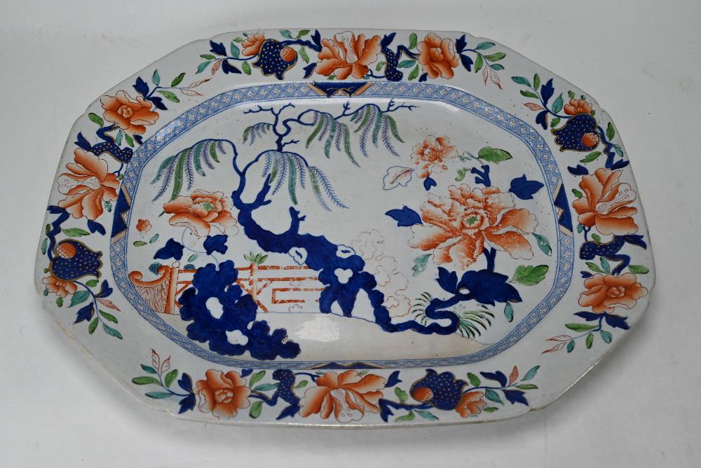 Ironstone turkey dish: A Georgian Ironstone turkey dish, printed and painted with Chinoiserie willow, rocaille and other decoration, in gilt, iron red, turquoise, green and underglaze blue; Royal coat of arms mark and 'No.7