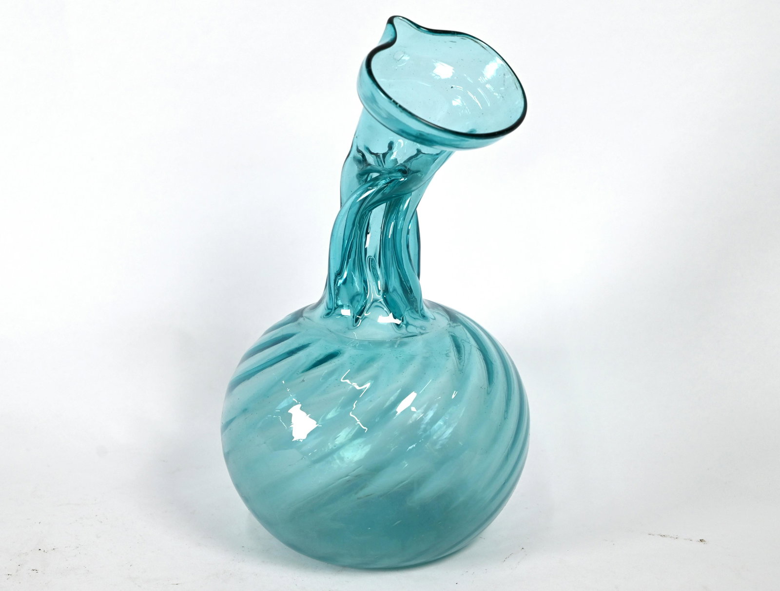 An antique German blue glass Kuttrolf: An antique German blue glass Kuttrolf (multi-stemmed flask) with 'collapsed' neck and writhen globular body, 27 cm high