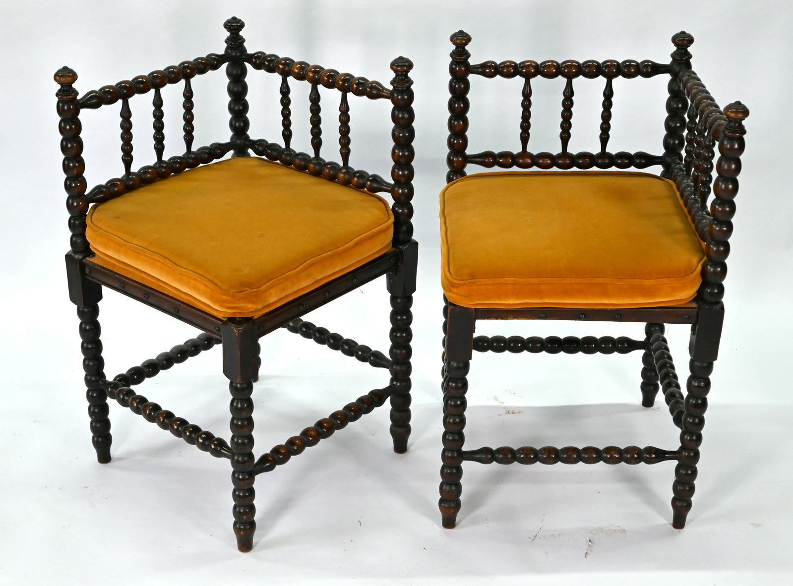 A companion pair of bobbin turned corner chairs: A companion pair of Arts & Crafts period bobbin turned corner chairs (2)