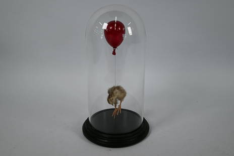 Polly Morgan (British b.1980) - 'Still Birth', a: Polly Morgan (British b.1980) - 'Still Birth', a taxidermy chick with red glass balloon, from an edition of 150, mounted under glass dome case, 26 cm h o/all