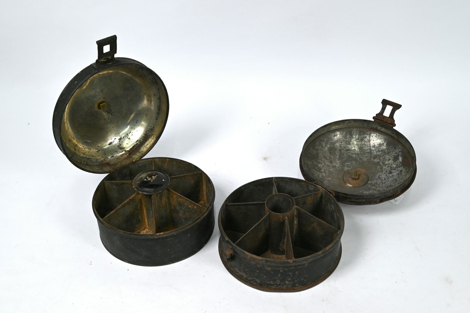 Two early 19th century japanned tin spice boxes: Two early 19th century japanned tin spice boxes with segmented interiors, one with original grater, the other named for Pearson & Co
