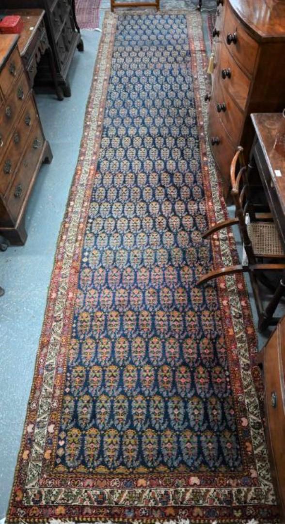 An antique Persian Hamadan runner, 512 cm x 109 cm (1 of 2)