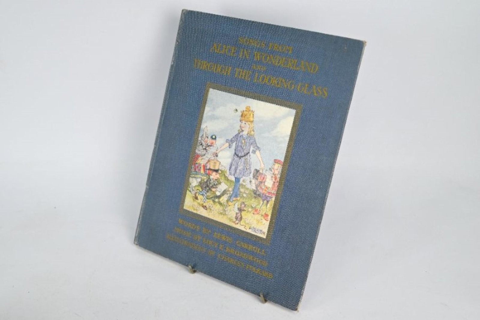 Songs From Alice in Wonderland and Through the: Folkhard, Charles (ill.), Carroll, Lewis and Broadwood, Lucy, E, Songs From Alice in Wonderland and Through the Looking-Glass, tipped in colour plates, London: A & C Black Ltd 1921, dec. blue cloth wi