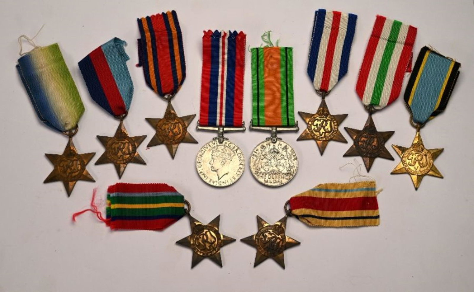 Seven WWII campaign stars to/w three others (10): Seven WWII campaign stars - 1939-45 Star; Atlantic Star; Africa Star; Burma Star; Pacific Star; France & Germany Star; Italy Star to/w a 'copy' Air Crew Europe Star, a 1939-45 war medal and a Defence 
