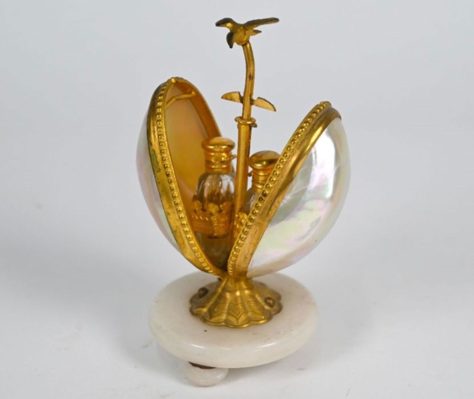 A Victorian gilt metal and shell scent bottle holder (1 of 2)