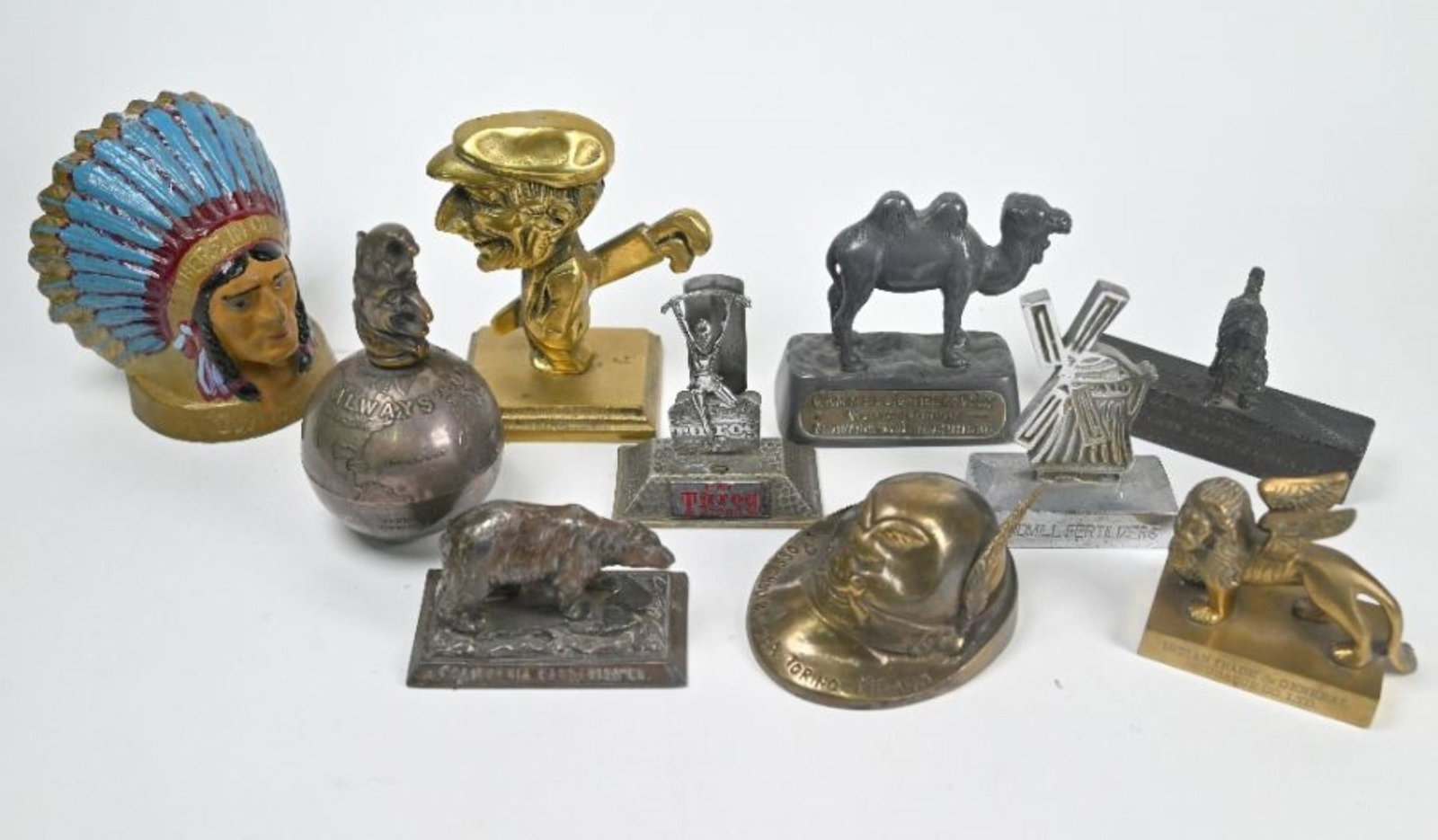 Ten various vintage metal advertising paperweights (1 of 4)