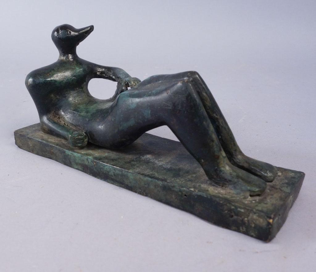 Figural Bronze Sculpture In Manner Of Henry Moore: A figural reclining sculpture in manner of Henry Moore 9"x2"x4"