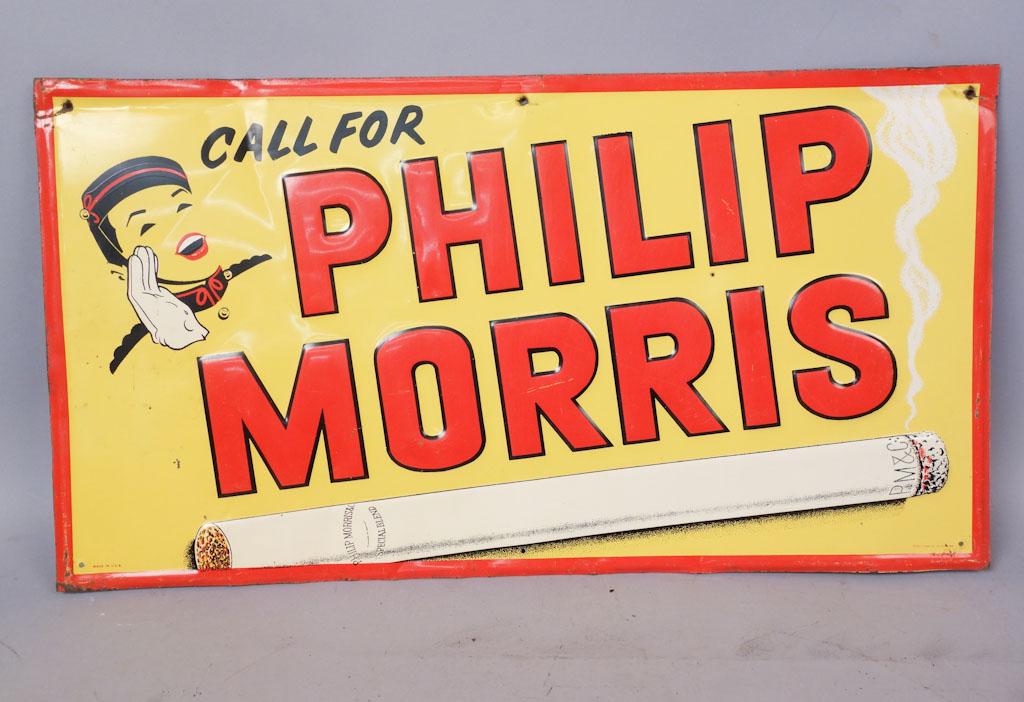 Phillip Morris Cigarette Metal Advertising Sign: A vintage Phillip Morris cigarette advertisement 27"x 14.5"