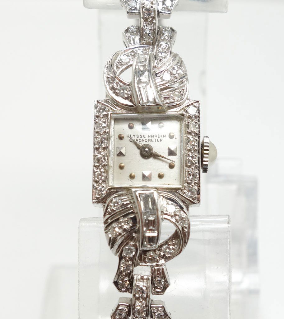 Ulysse Nardin Art Deco Ladies Platinum Diamond Watch: Ulysse Nardin Art Deco Ladies Platinum Diamond Chronometer Watch. The single-cut and baguette diamonds are all approximately VS in clarity and GH in color. approximately 6 1/2" inside diameter