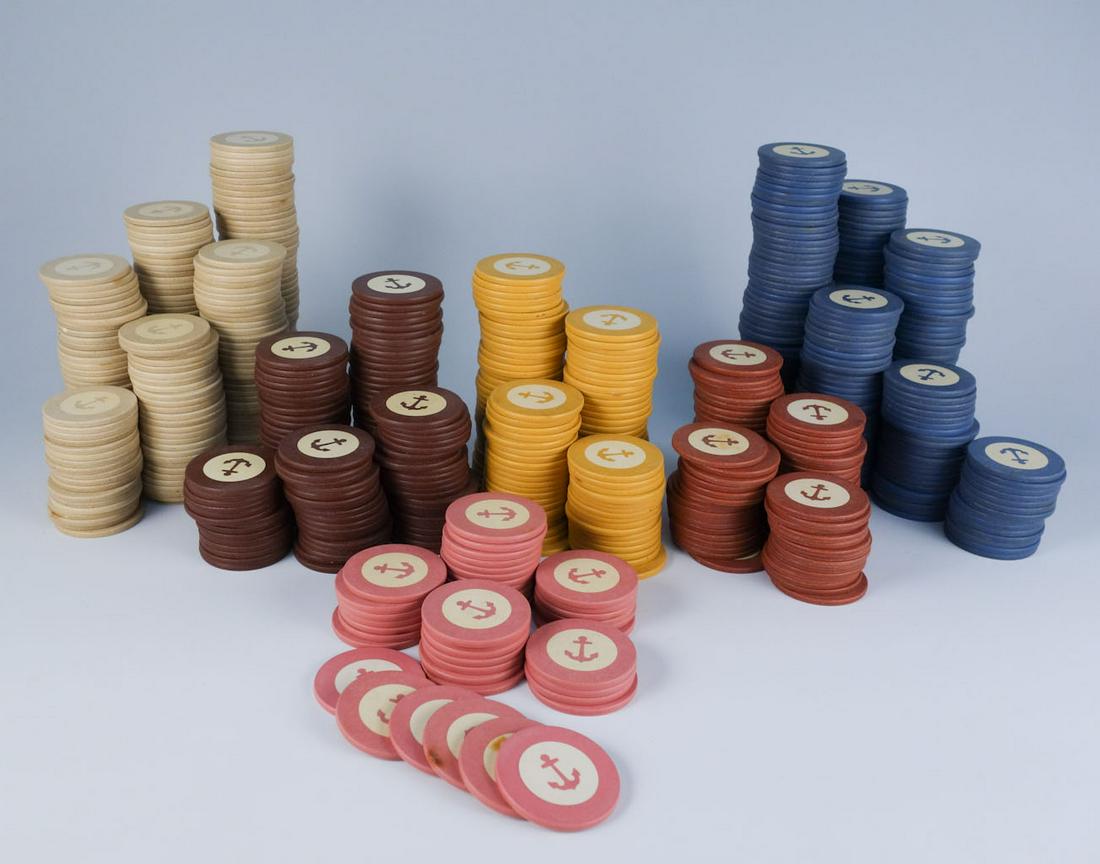 Large Group Early 20c Anchor Motif Gambling Chips: This is a large group of early 20th century gambling chips with anchor motifs. They come in blue, white, red, pink, yellow, and brown. 1 1/2" diameter
