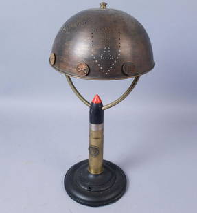 Homemade Shell Case Lamp: Shell cases has the seal of the US Army on the side. Shade stamped "16th Infantry" "18th Infantry" along with the insignia of the 1st Infantry division. 19" x 17"