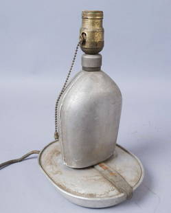 Homemade Canteen/Mess Kit Lamp: Lamp made from a mess kit and a canteen. Canteen stamp "U.S." "L. F. & Co." "1918". 12 1/2" x 6"