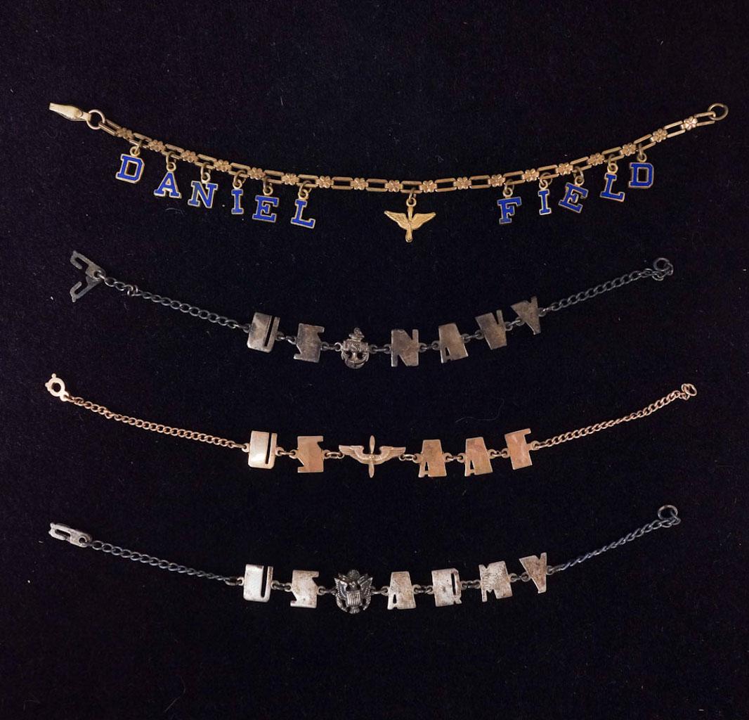 Lot of 4 Military Themed Charm Bracelets: 4 Military themed charm bracelets of varying metals. 6 1/2" - 7 3/4" laid out