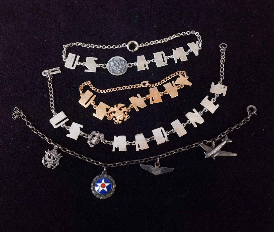 Lot of 4 Military Themed Charm Bracelets: 4 Military themed charm bracelets of varying metals. 6 1/2" - 7 3/4" laid out