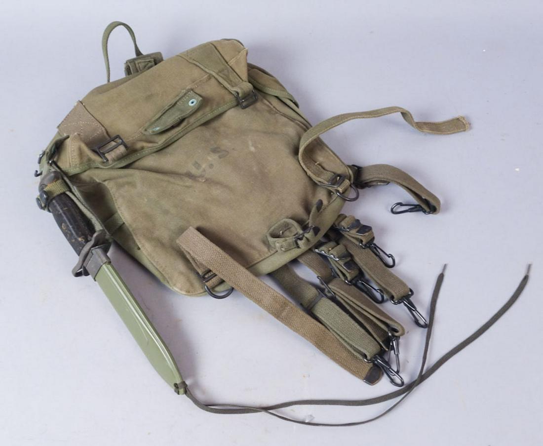 WW2 US Army Backpack with M-4 Bayonet: Canvas US Army field backpack with M-4 bayonet knife attached. 14"x12"