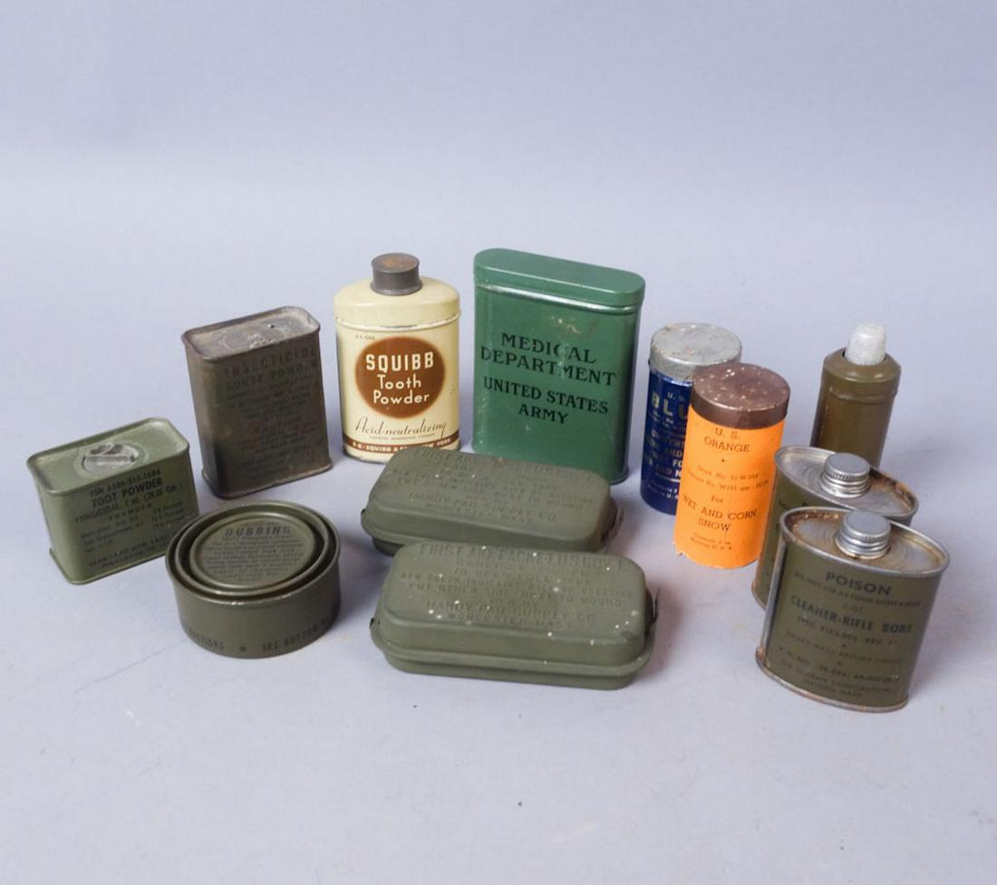 Lot of WW2 Assorted US Army Toiletries: 12 boxes, tins, canisters including: a sewing kit, foot powder, two wax sticks, insecticide, shoe polish, tooth powder, two rifle cleaner cans, one empty bandage tin, and two first aid kits.