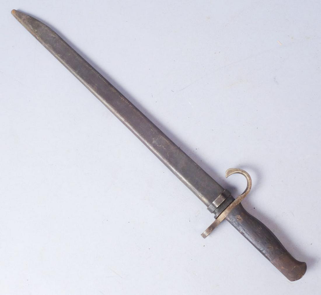 Japanese WW2 Type 30 Bayonet: Type 30 Japanese bayonet. Mark on blade associated with Tokyo Arsenal. Metal scabbard. Serial number on pommel 2998409 with three unknown symbols below serial number. overall 20 5/8" blade length: 15 