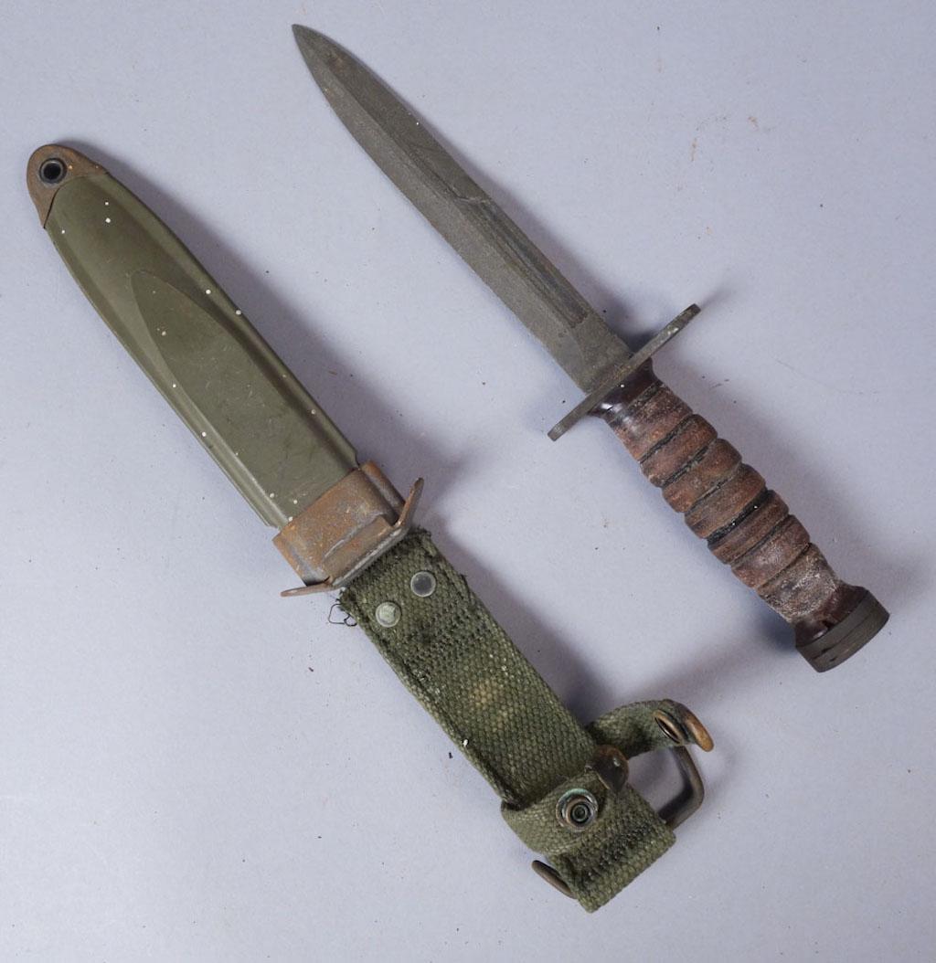WW2 US M-4 Bayonet Knife: US M-4 bayonet Knife with sheath. Marked "US M-4 Camillus" on crossbar. Marked "S" on pommel. Total 11 5/8", blade 6 3/4"