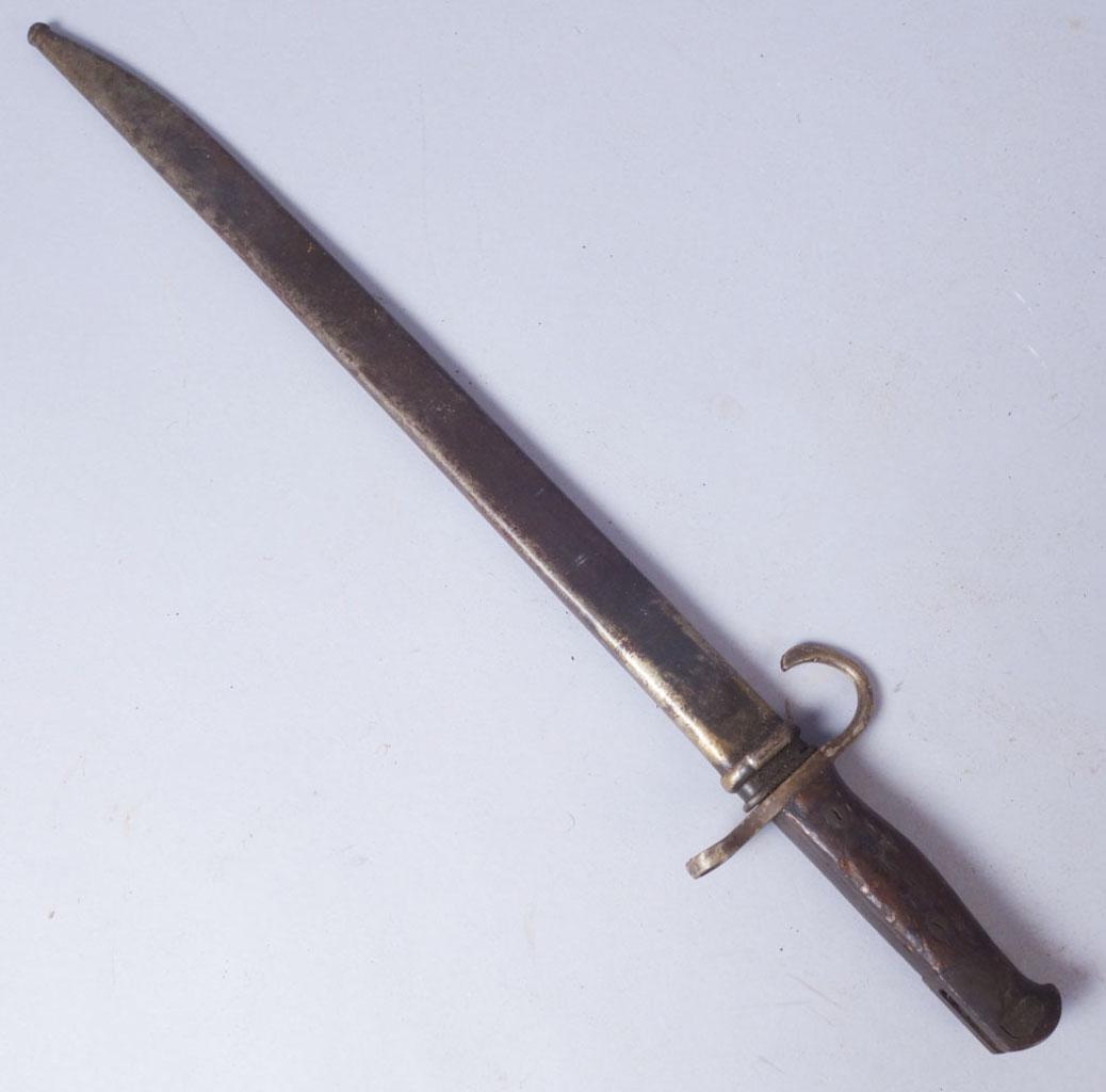Japanese WW2 Type 30 Bayonet: Type 30 Japanese bayonet. Mark on blade associated with Tokyo Arsenal. Metal scabbard. Unknown kanji on underside of hand guard. "85" stamped on side of pommel. Serial number on pommel A30650056, poss
