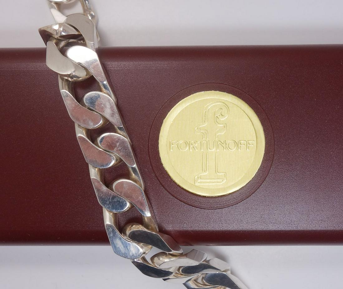 Vintage Fortunoff Silver Chain Link Bracelet Italy 71g: This is a vintage chain bracelet. Rendered in fine silver, it features a heavy chain link pattern. The clasp is stamped " * 7 AR" and 526. 9" laid out. This bracelet weighs 71g.