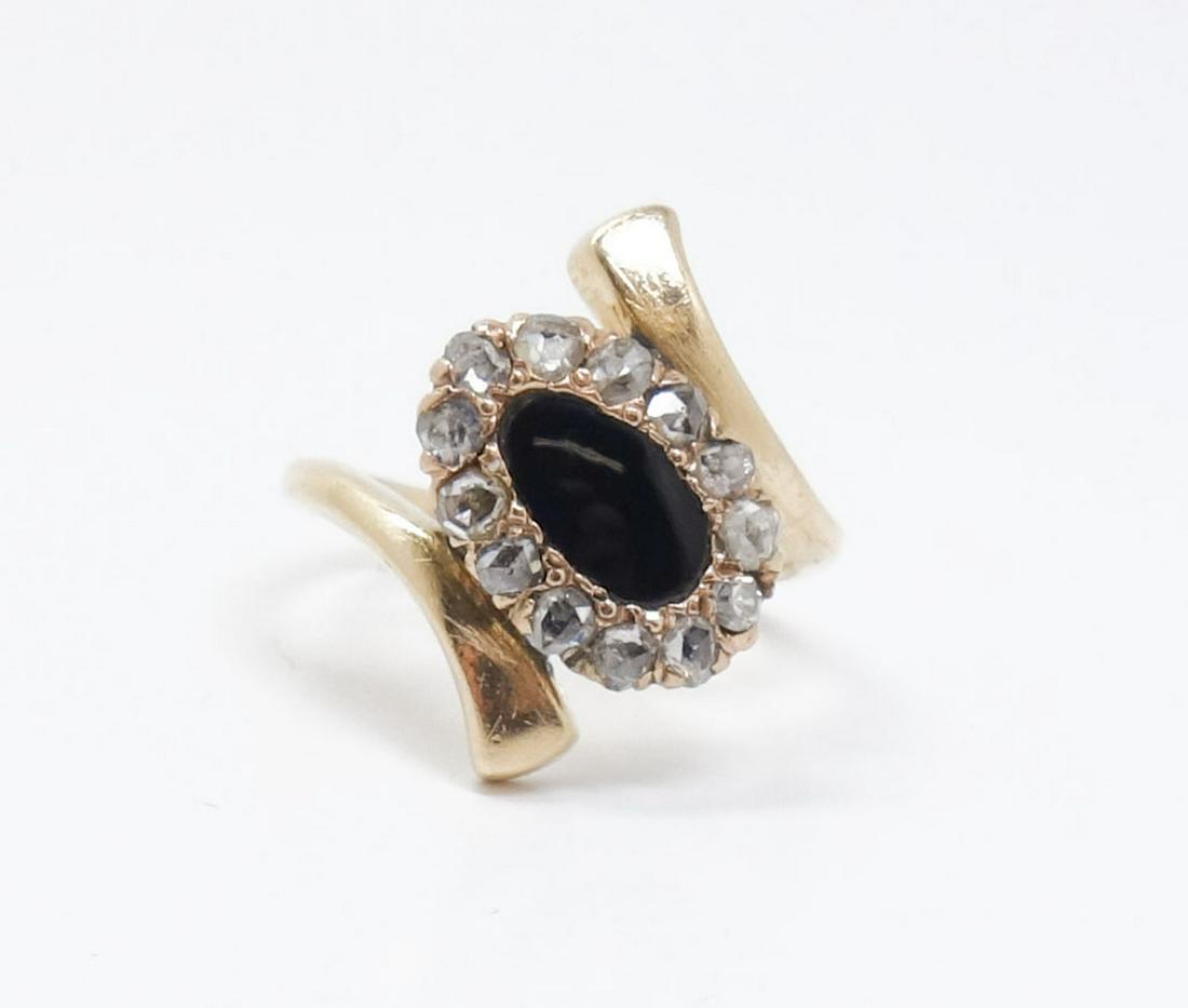 Vintage 1930/40s 14k Black Onyx Rose Cut Diamond Ring: This is a glamorous vintage ladies ring featuring an eye-catching black onyx cabochon surrounded by 13 one-two point rose cut diamonds. The onyx and diamonds are set in an elegant 14k yellow gold ring