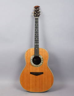 Ovation Deluxe Balladeer Guitar w Case: This is an Ovation Deluxe Balladeer guitar for restoration with case. guitar: 40 1/2" x 15 1/2" x 5 3/4" case: 43" x 16 3/4" x 6 1/2"