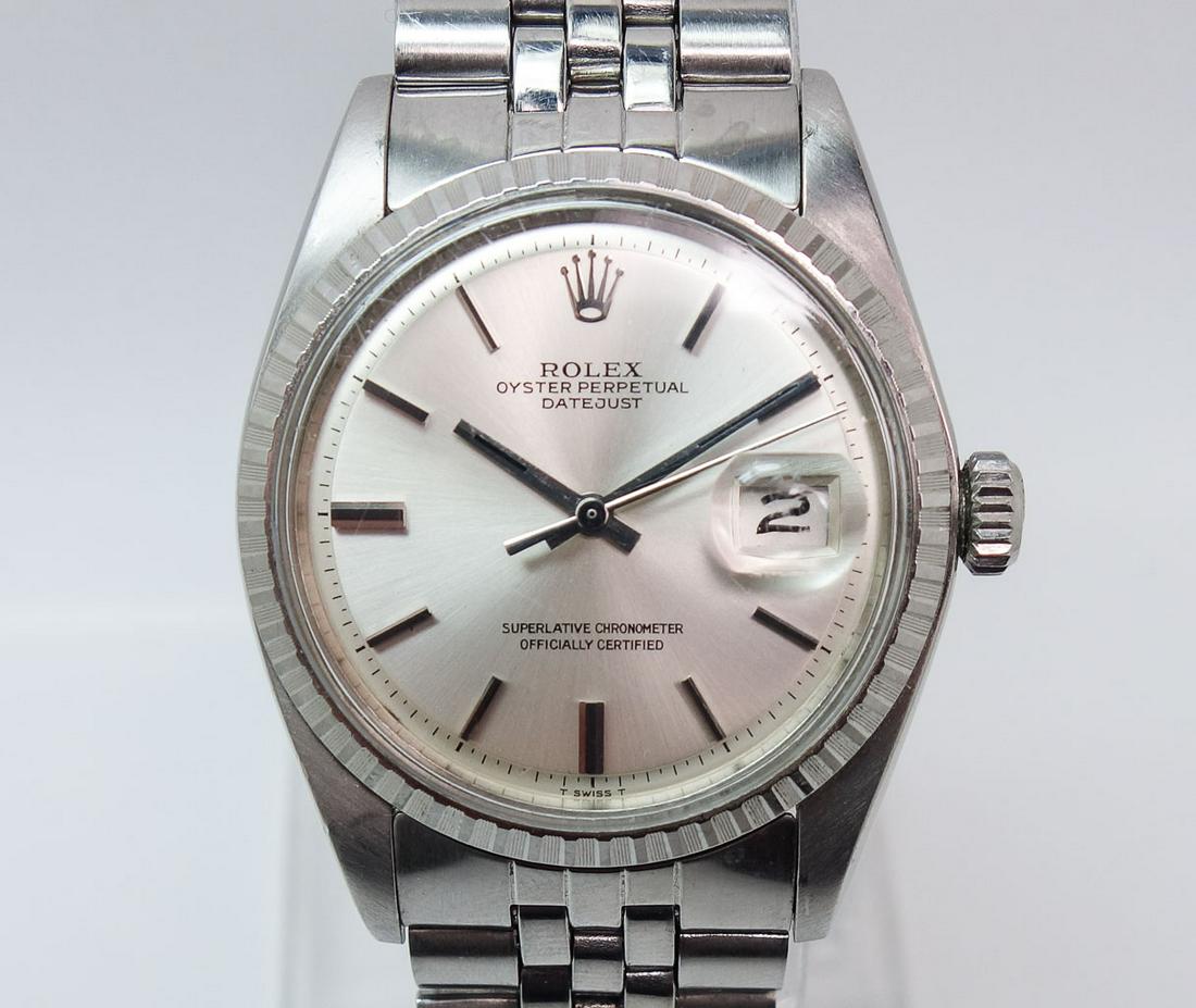1973 Rolex Stainless Steel Datejust Mens Watch #1603: A classic 1973 Rolex Stainless Steel Datejust #1603 Serial #3223418 wristwatch. The watch case measures 34mm x 34mm. The case including the crown measures 38.9mm. From lug end to lug end it measures 4