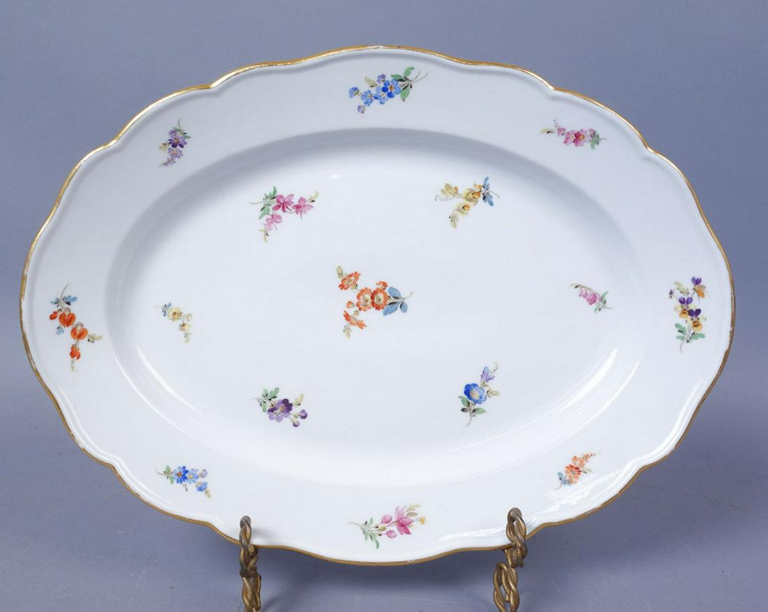 Meissen HP Scattered Flowers Porcelain Oval Platter: Estate found antique porcelain serving tray from Meissen of Germany in the early 20th century. This tray is decorated with the hand painted Scattered Flowers pattern. Edged with gilded trim. The under