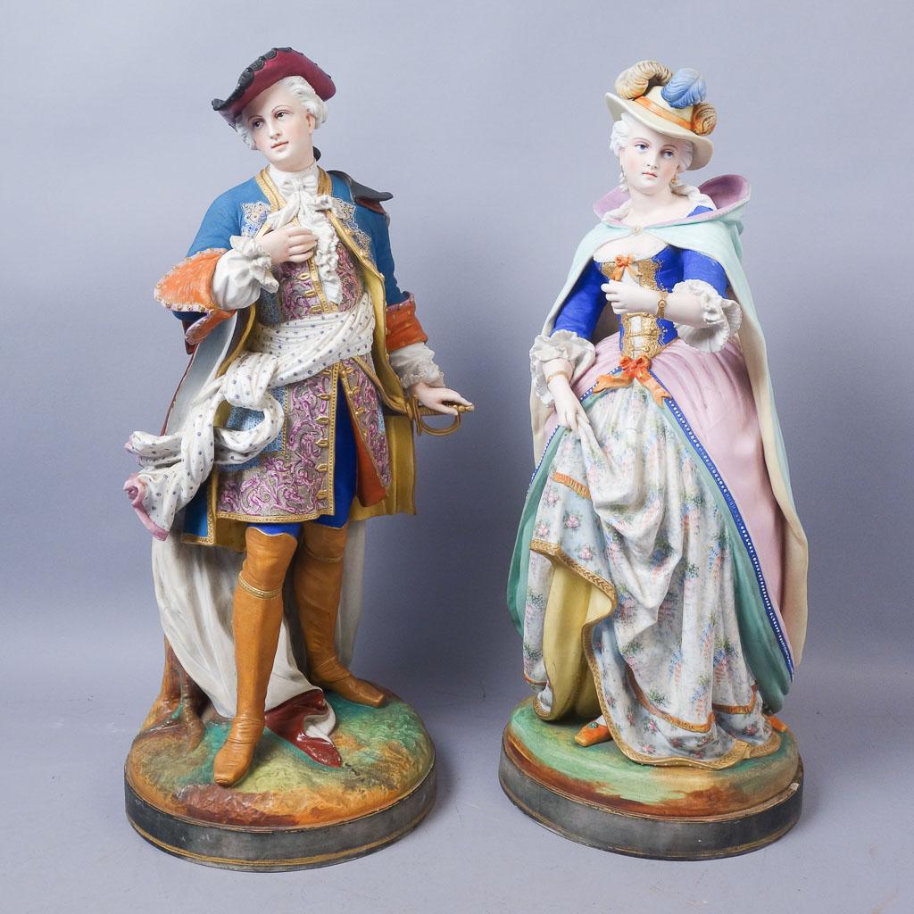 Pair Antique French Biscuit Porcelain 26" Figurines: This pair of 19th century figurines show an exceptional quality of hand painted detailing and modeling. 28" tall