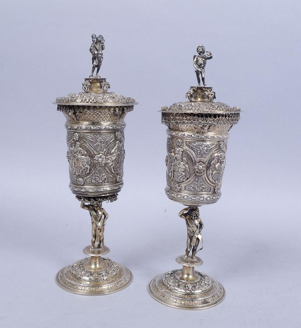 Pr Renaissance style 800 Silver 19c German Goblets: A fine pair of ornate 800 silver 19th century German goblets. The total weight of the set is 26.26ozt. The complete goblet 8 1/4" x 3 1/2".