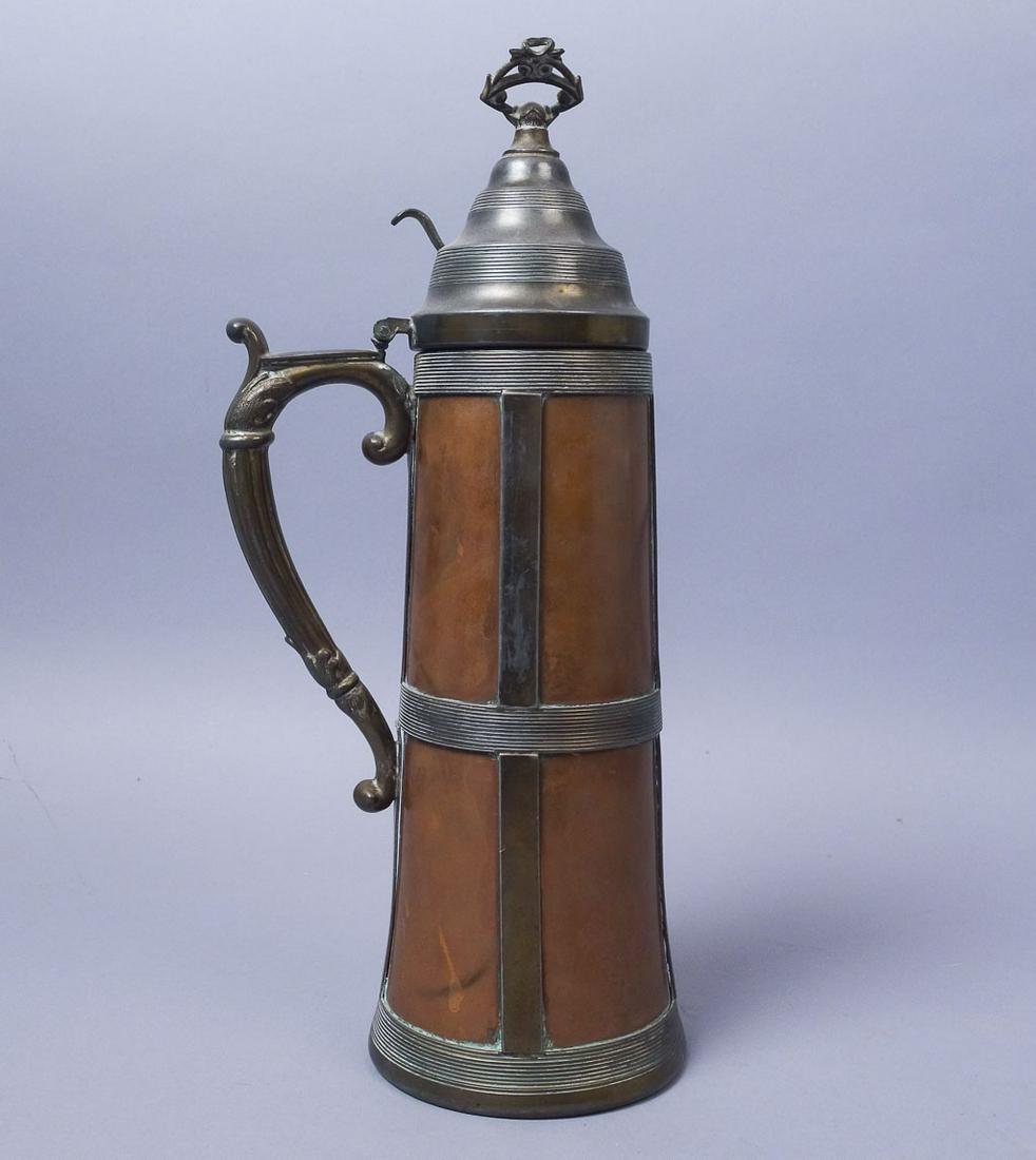 Arts & Crafts c. 1900 Apollo Studios Copper Brass Stein: This is an arts and crafts 1900 copper and brass tankard stein by Apollo Studios. Height 14"