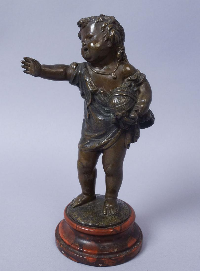 Bronze Figurine of Toddler w Toy Cradle Signed Moreau: This is an antique bronze figurine of a toddler with a toy cradle signed Moreau. height 6 1/2"