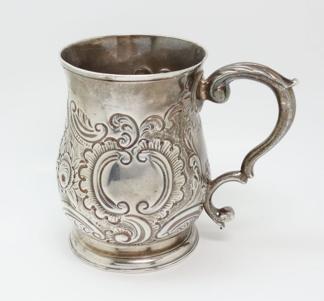 T&W Chawner London 1762 Sterling Silver Childs Mug: This is an antique estate found child's mug made by Thomas & William Chawner of London, England in 1762. The diminutive mug features ornate floral repousse designs. No Monograms. Fully hallmarked. It 
