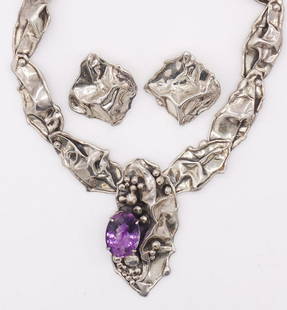 Brutalist Sterling Amethyst Necklace Earrings Suite: A vintage studio necklace and earrings suite rendered in sterling silver. This Brutalist/biomorphic set features movement and depth. The pendant is set with an oval faceted amethyst. The max length