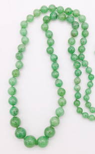 Graduated Green Jadeite Bead Single Strand Necklace: This is a single strand necklace with green jadeite graduated beads. It is 30" long, the beads range from 6.2 to 13.7mm, and it weighs 71.4dwt.