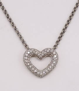 Luca Carati Open Diamond Heart Pendant in 18K: This Luca Carati open pave diamond heart pendant is made in 18K white and yellow gold. The pendant hangs on a 16" double link rolo chain. This necklace is 16" long, the heart pendant measures 1" x