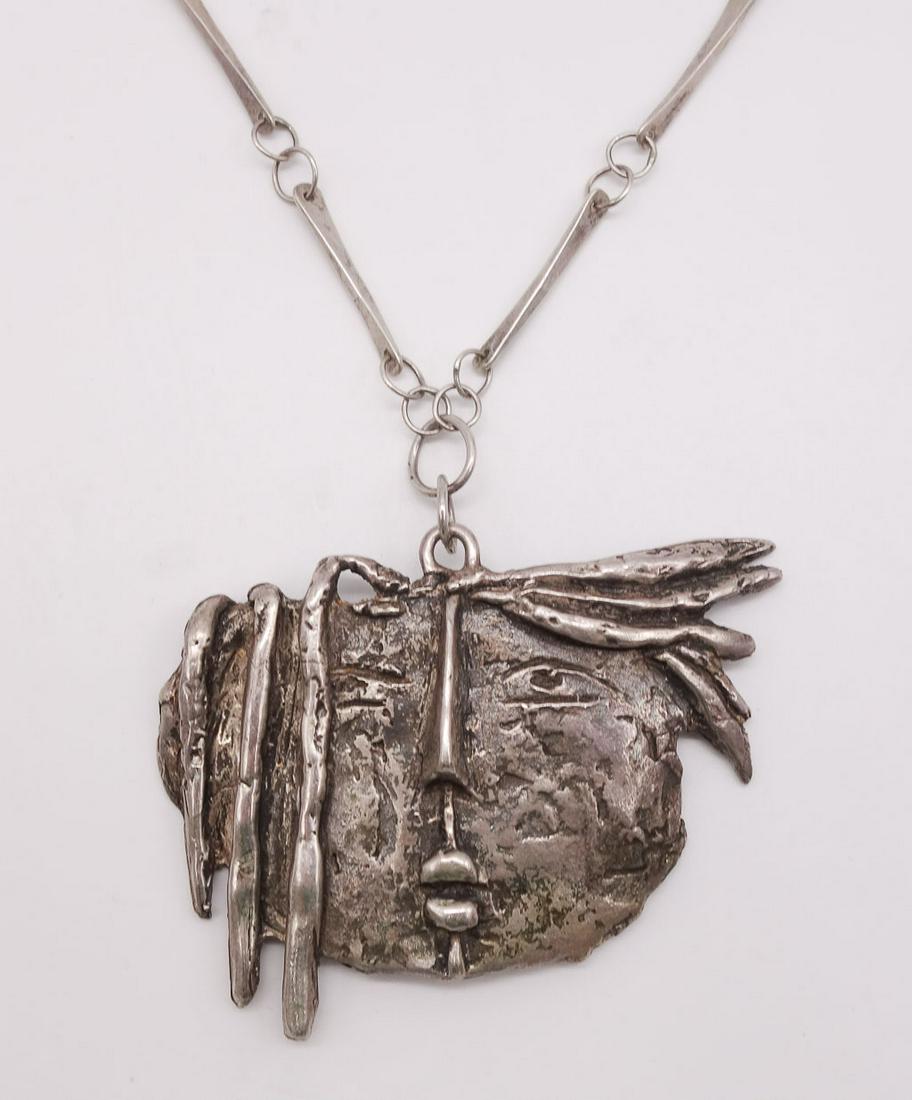 Angel Botello Sterling Silver Sculpture Necklace: This is an unusual sterling silver pendant necklace from Spanish-Puerto Rican artist and jewelry designer Angel Botello (1913-1986). Botello was dubbed "The Caribbean Gauguin" for his use of bold colo