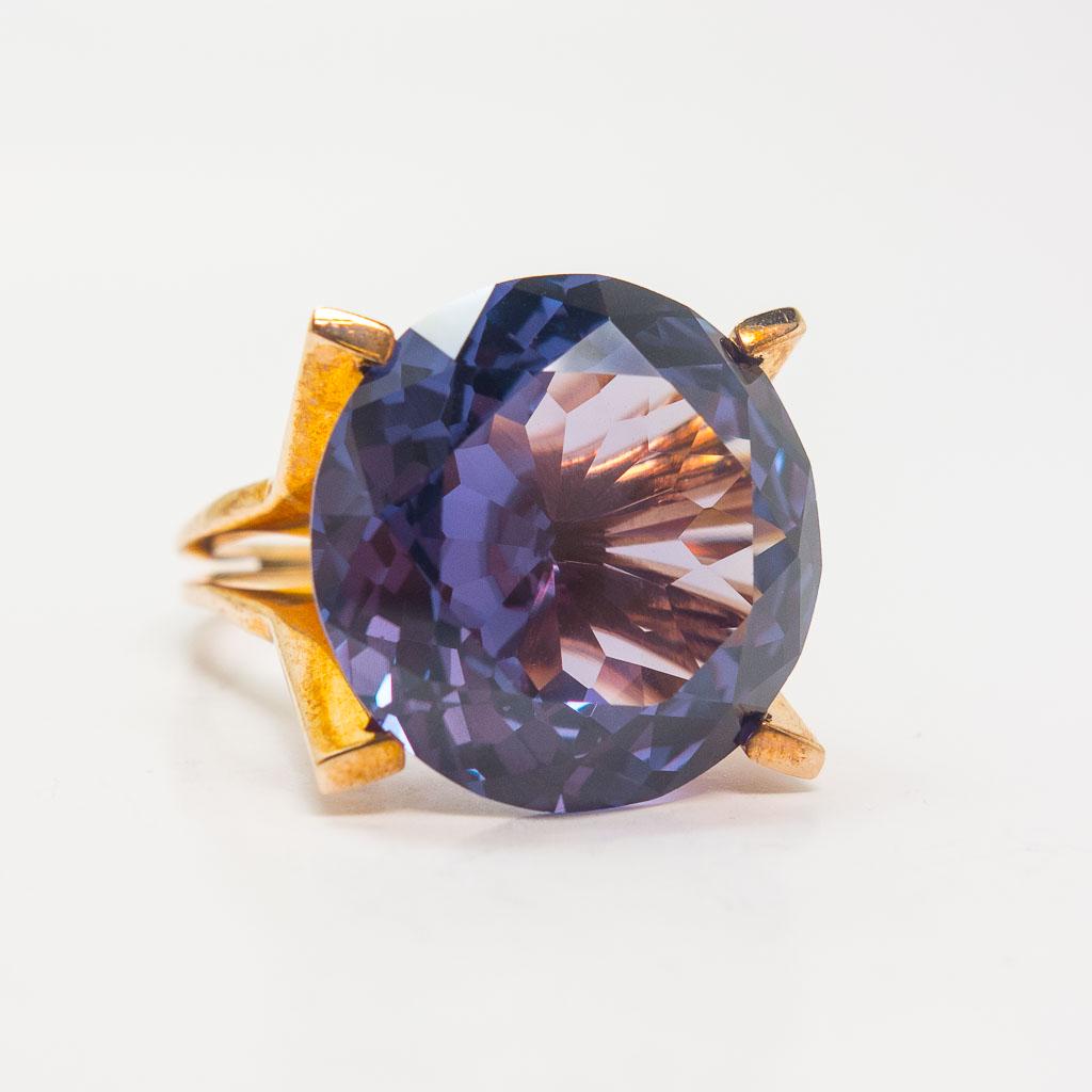 Retro Alexandrine Ring in 14K Rose Gold Size 8: This size 8 ring 14K rose gold features a round faceted synthetic color change sapphire commonly known in the trade as "alexandrine". It changes from purple to bluish-violet. Alexandrine jewelry was v
