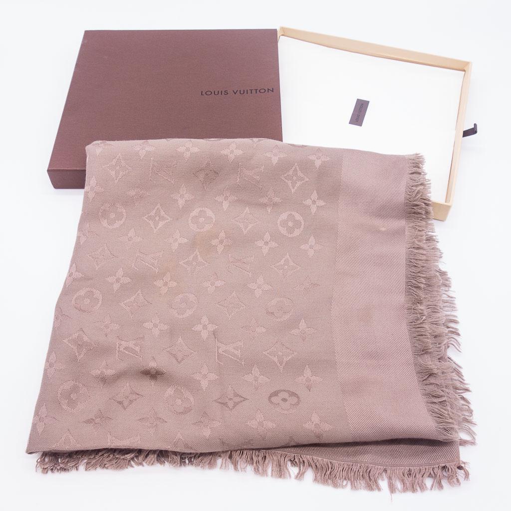Louis Vuitton Silk Wool Monogram Shawl w Box: This is a grey Louis Vuitton silk wool Monogram shawl with the original sewn label and box. Shawl measures 56" x 57". Box measures 10 5/8" x 1 1/4".