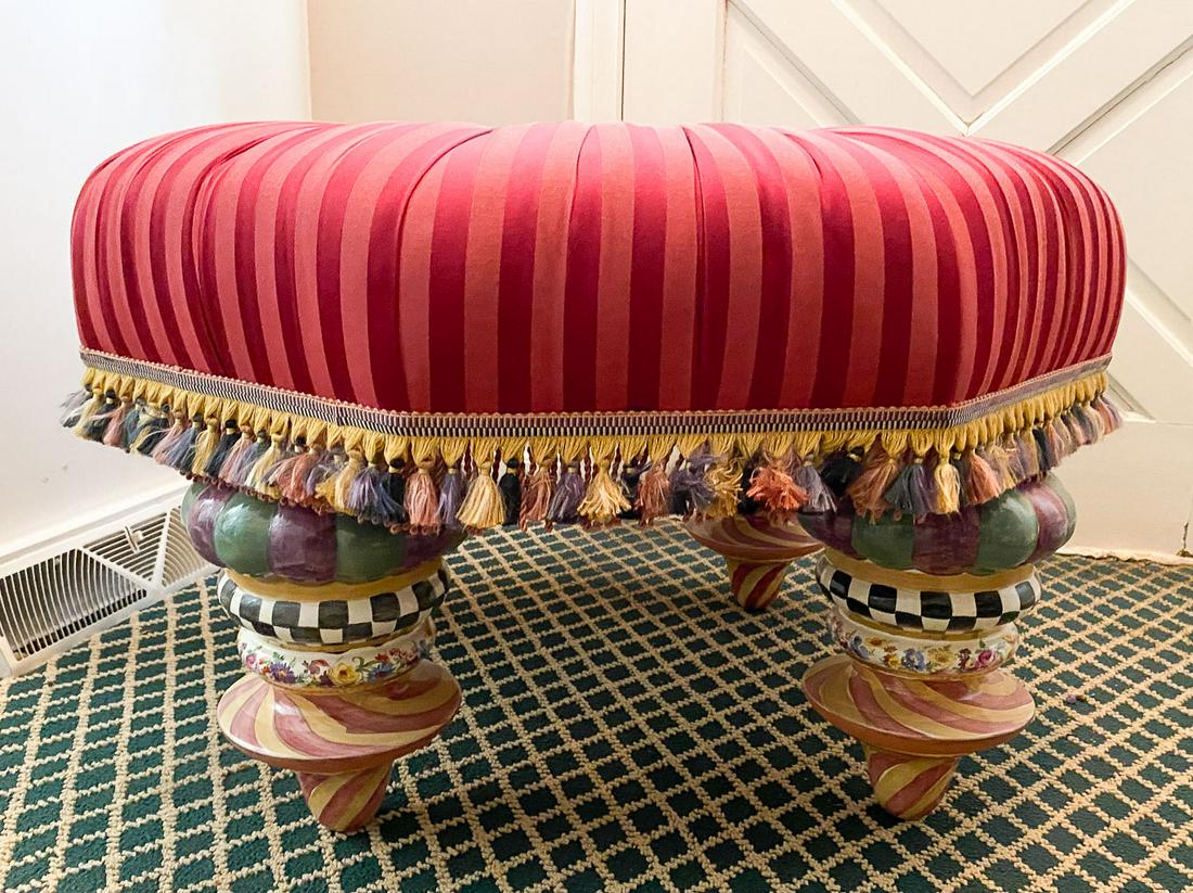MacKenzie-Childs Burgundy Silk Upholstered Ottoman: This is a whimsical handmade and decorated octagonal ottoman from MacKenzie-Childs Ltd. It is topped silk burgundy upholstery. It measures 31 x 20".